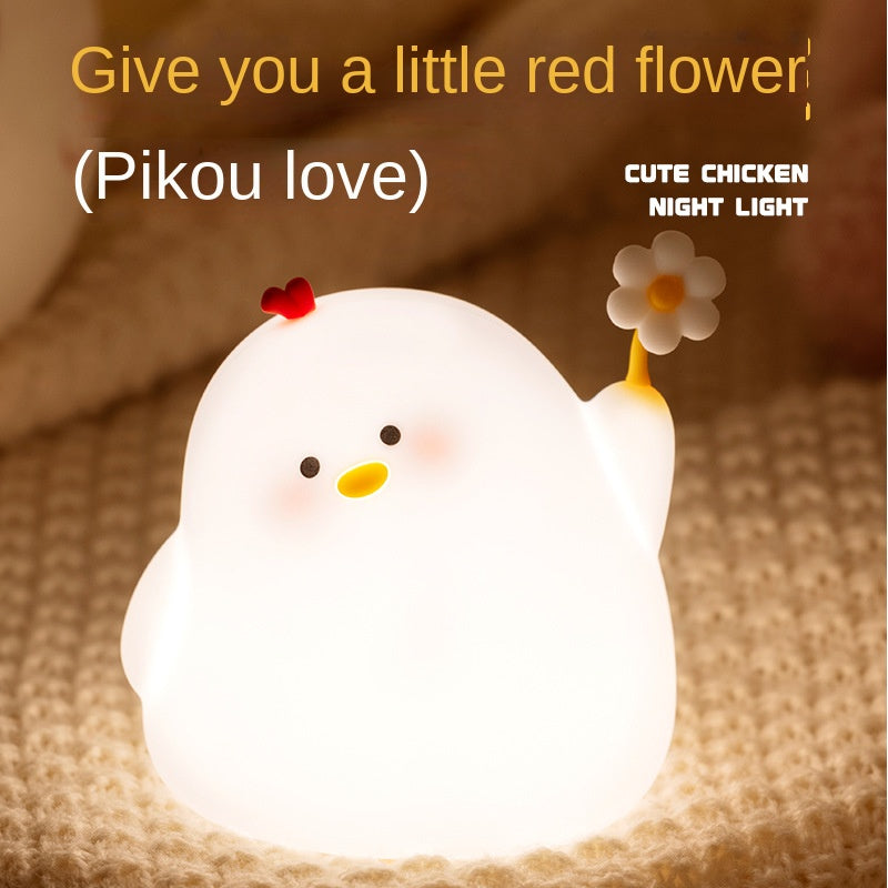 Linda luz nocturna de pollo con flores para niños la lámpara de pollo con flores es una decoración estética de dormitorio lámpara blanda de silicona de grado alimenticio